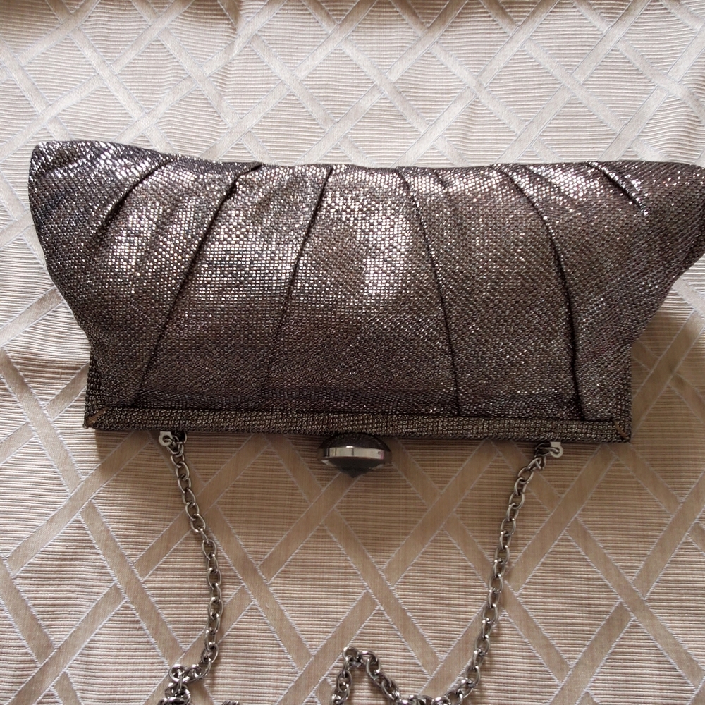 Evening rose gold glitter purse worn twice in excellent condition.